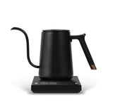 Black Timemore 600ml electric pour-over kettle on its base